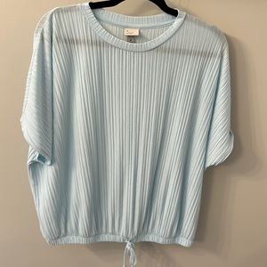 A New Day pale blue top with pleat appearance, faux tie bottom.
